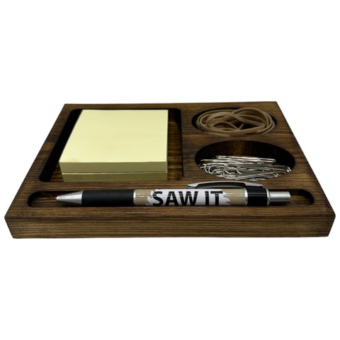 Wooden office desk tidy with pen, sticky notes, paperclips
