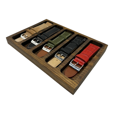 Wooden watch strap tray with watch straps inside