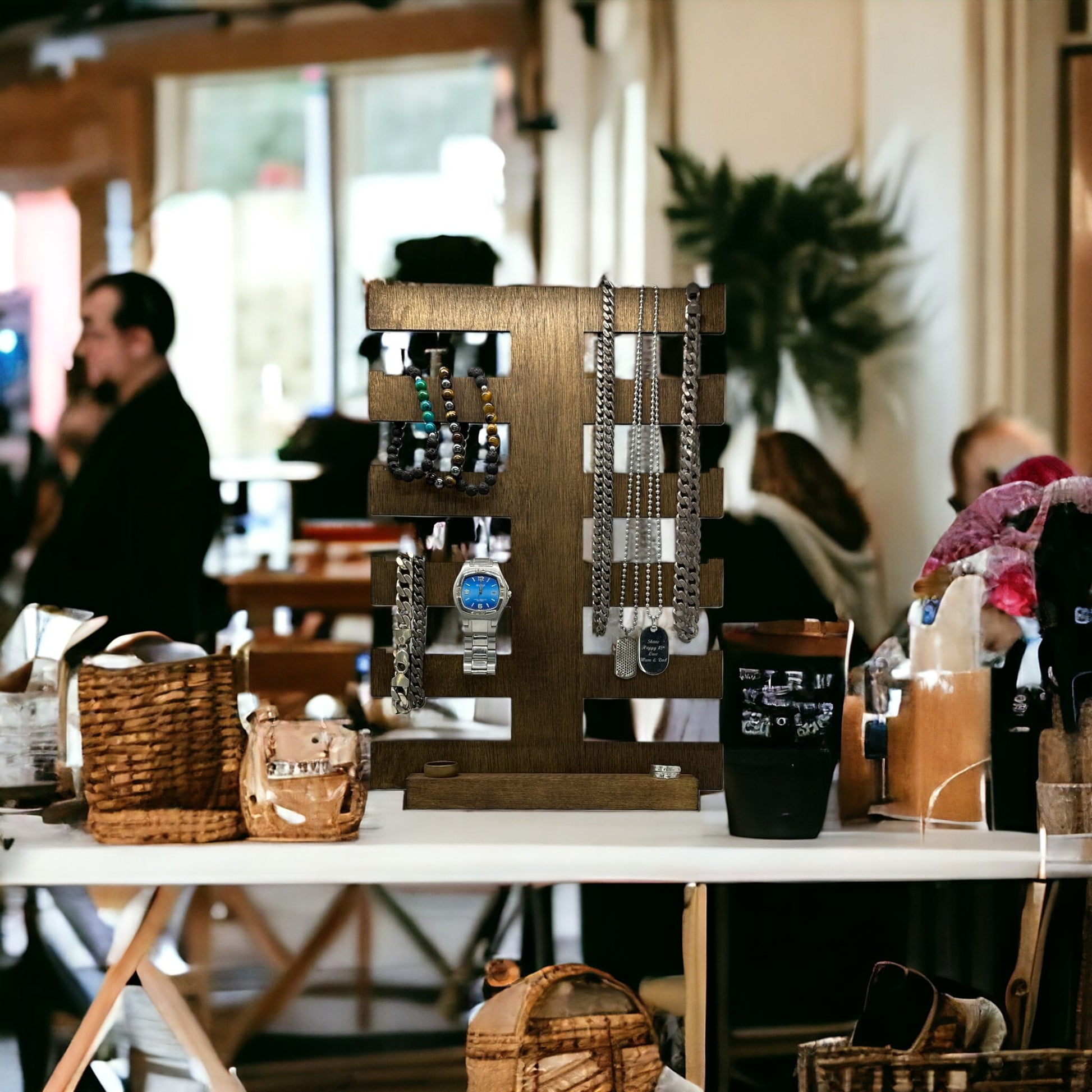 multi arm jewellery display with jewellery on