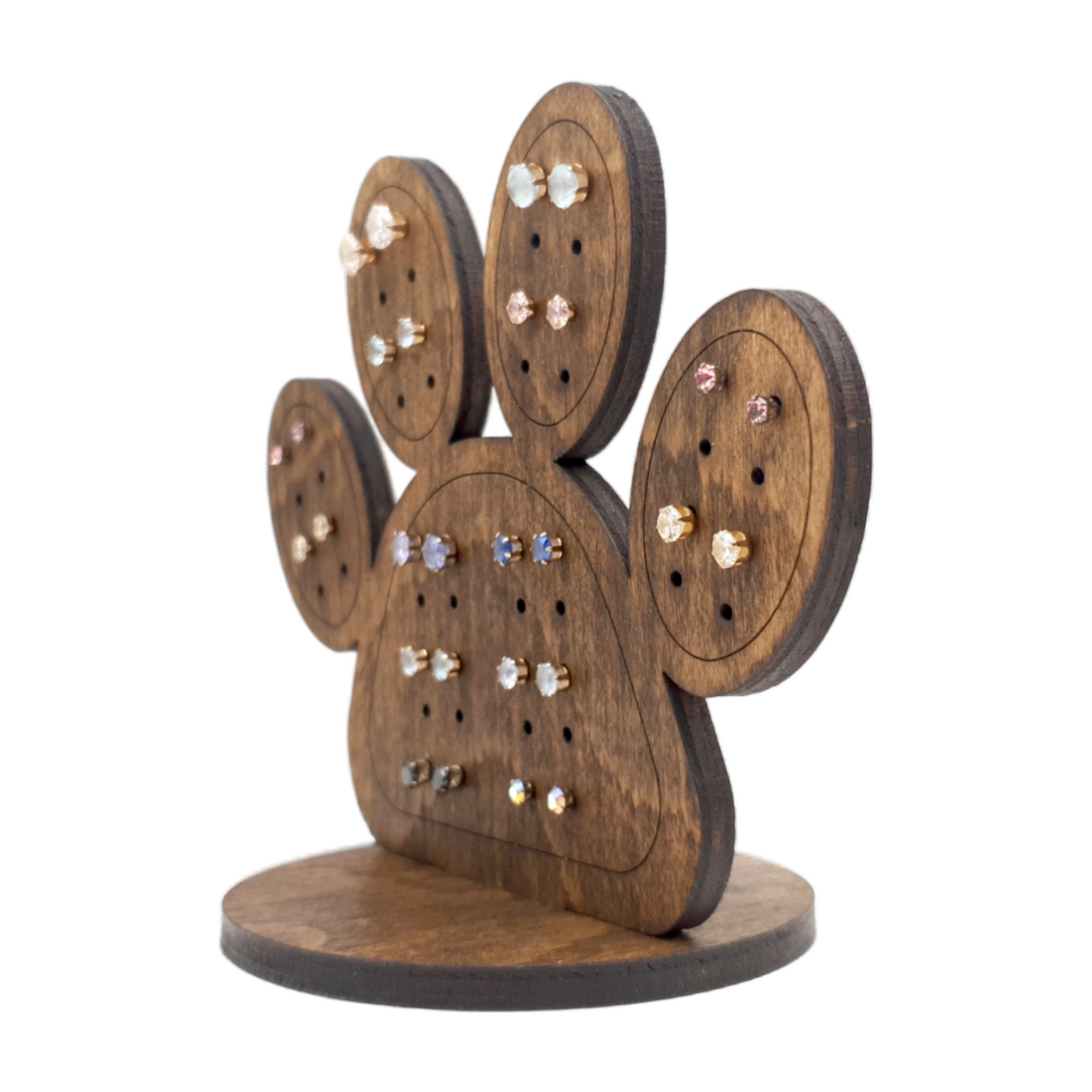plywood paw shaped earring display with earrings