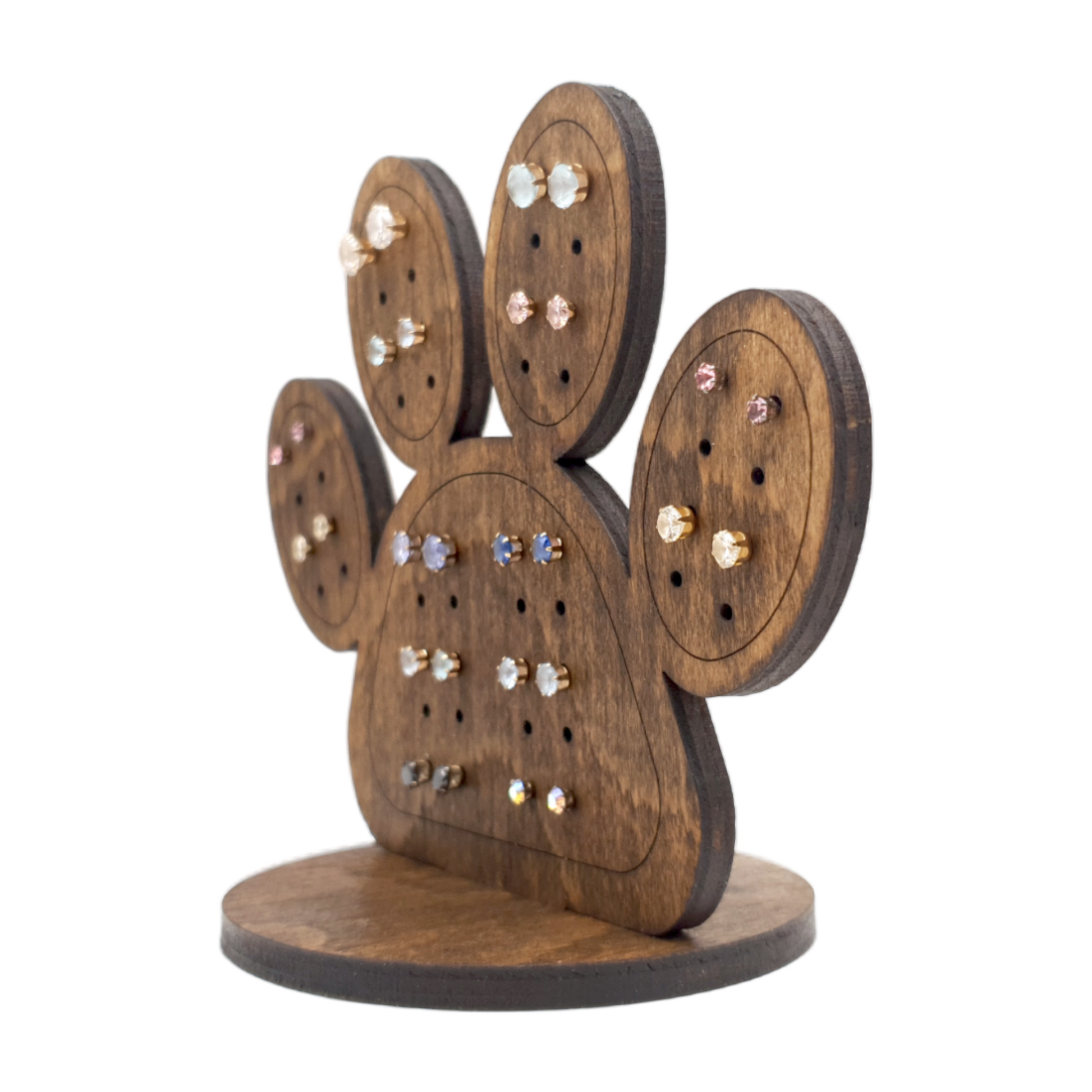 plywood paw shaped earring display with earrings
