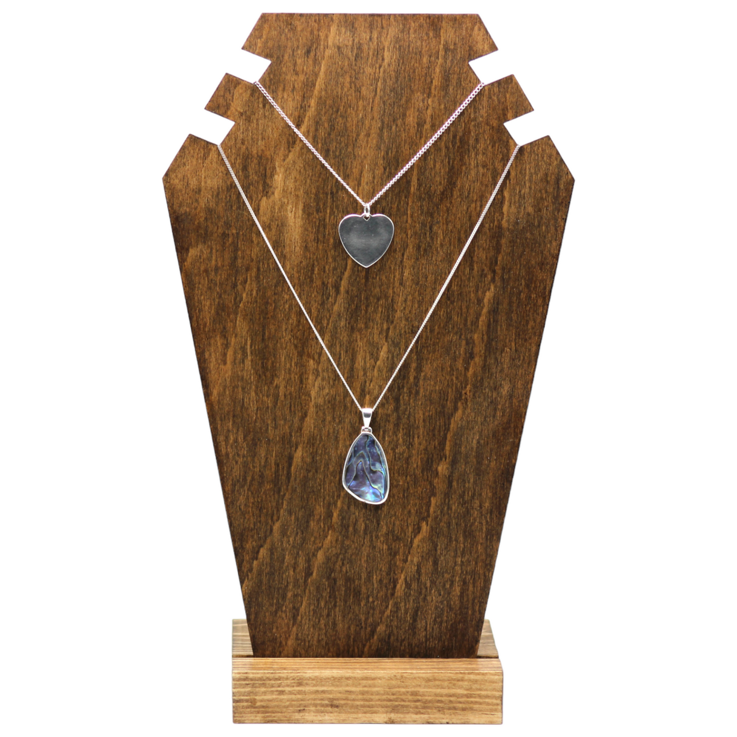 Plywood bust display with necklaces on 