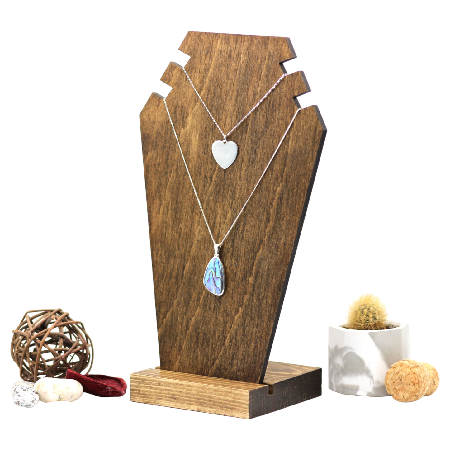 Plywood bust display with necklaces on 