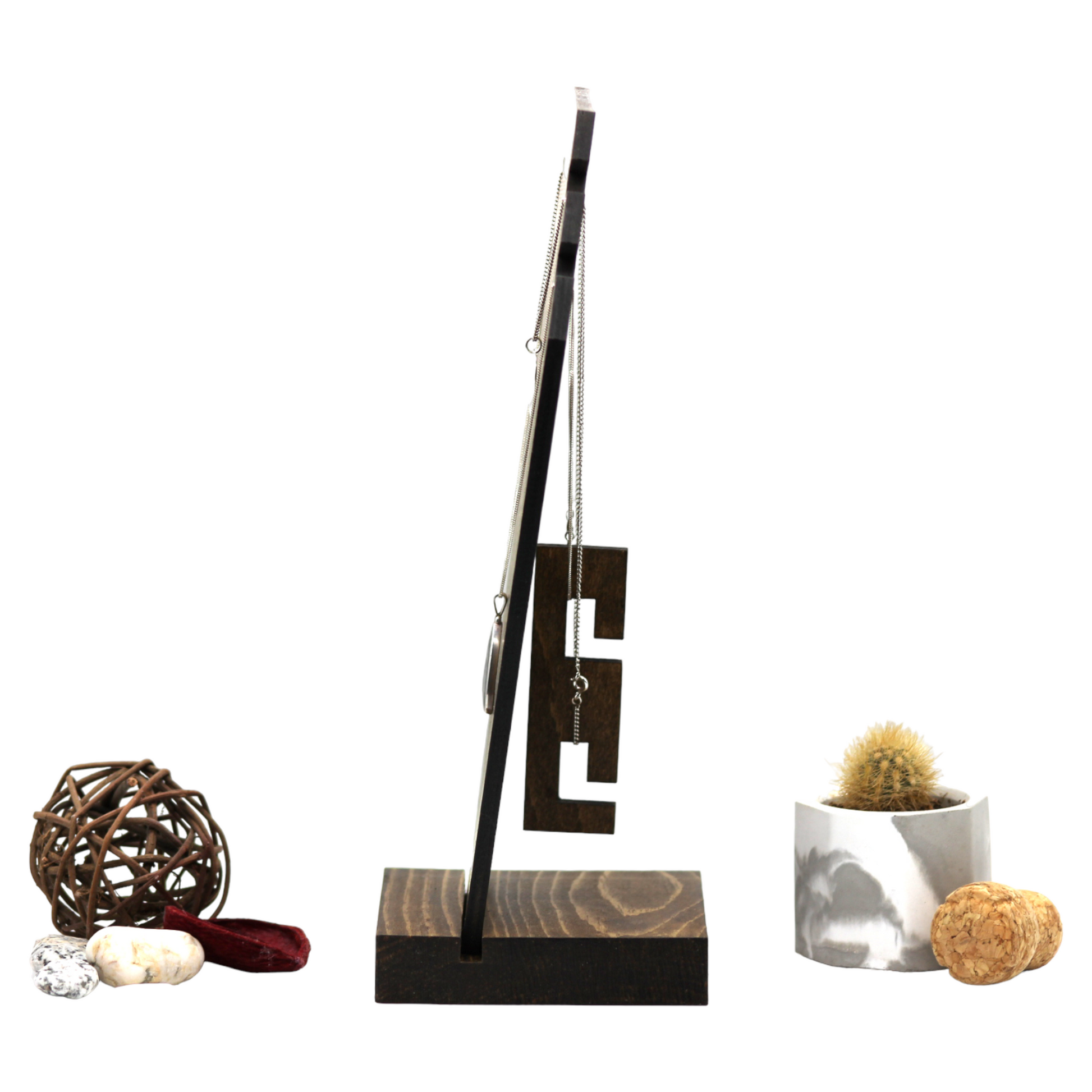 Plywood bust display with necklaces on showing counterweight