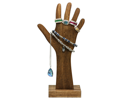 Plywood hand display with jewellery